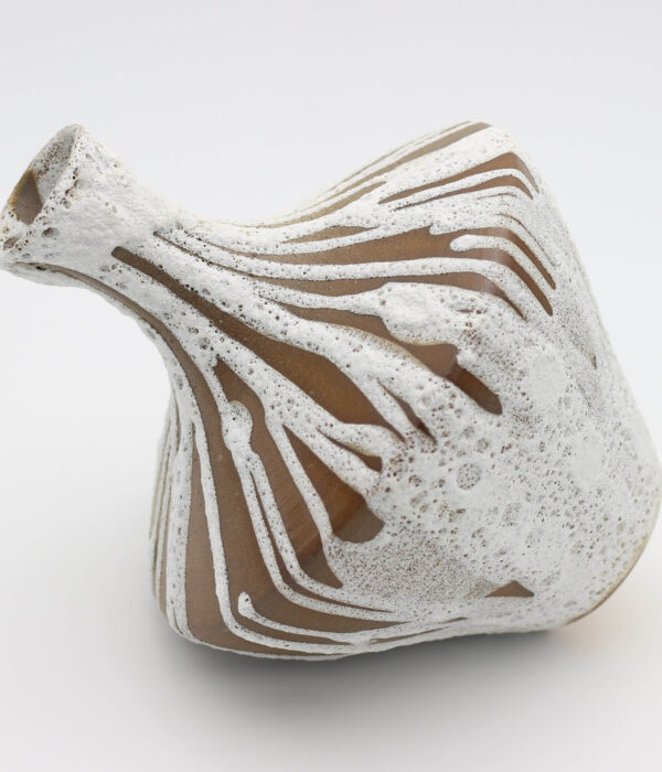 Vessel with volcanic glaze